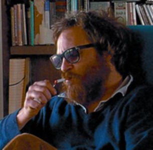 Joaquin Phoenix, el 6 de setembre a Ven�cia, on es va presentar el documental 'I'm still here' (a la dreta, l'actor, en un fotograma del film).